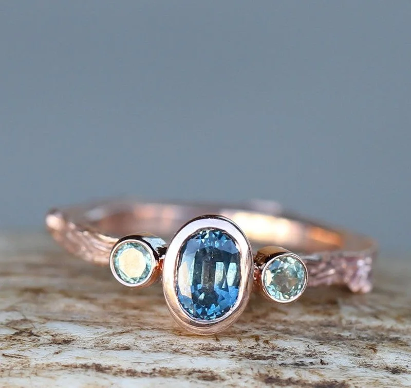 OVAL LONDON BLUE TOPAZ ENGAGEMENT RING WITH SAPPHIRE ACCENTS