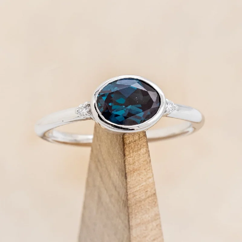 "SASI" - OVAL LAB-GROWN ALEXANDRITE ENGAGEMENT RING WITH DIAMOND ACCENTS