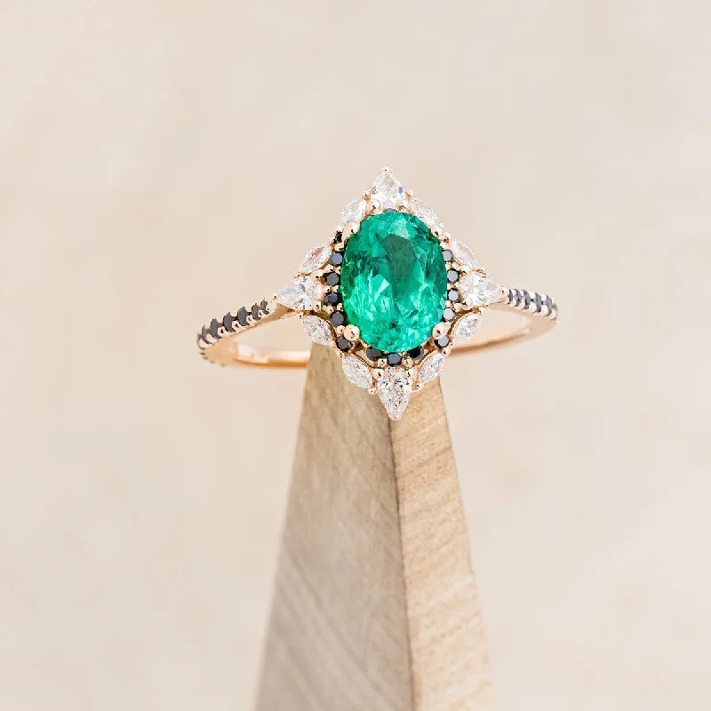 "NORTH STAR" - OVAL LAB-GROWN EMERALD ENGAGEMENT RING WITH DIAMOND HALO & BLACK DIAMOND ACCENTS