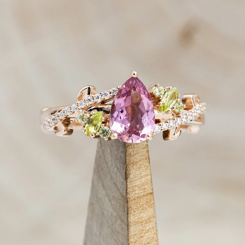 "KAMILA" - PEAR CUT PINK TOURMALINE ENGAGEMENT RING WITH PERIDOT & DIAMOND ACCENTS