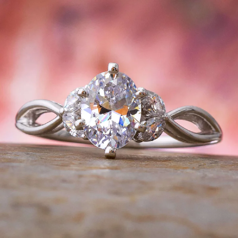 Oval Diamond Engagement Ring With Leaf Accented Band