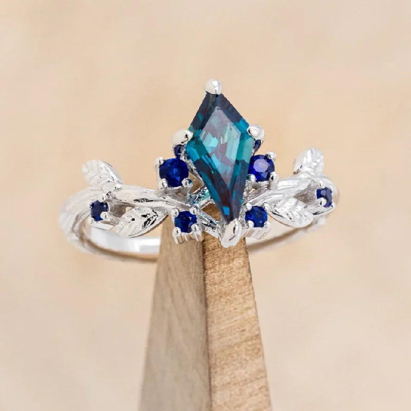 "ARTEMISIA" - KITE CUT LAB-GROWN ALEXANDRITE ENGAGEMENT RING WITH SAPPHIRE ACCENTS