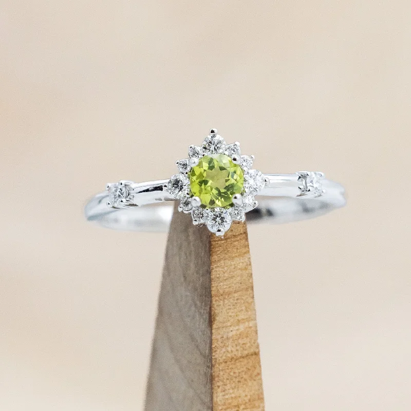 "STARLA" - ROUND CUT PERIDOT ENGAGEMENT RING WITH STARBURST DIAMOND HALO