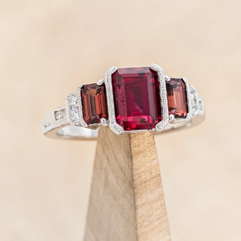 "HAZEL" - EMERALD CUT LAB-GROWN RUBY ENGAGEMENT RING WITH GARNET & DIAMOND ACCENTS