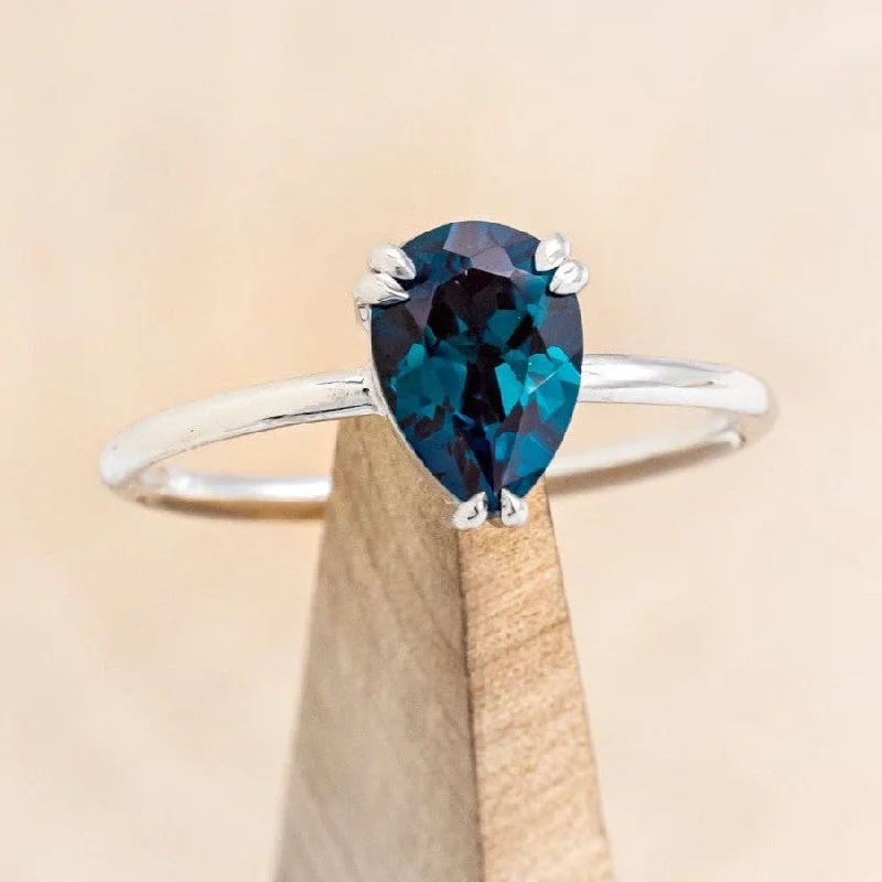 "ANDROMEDA" - PEAR CUT LAB-GROWN ALEXANDRITE ENGAGEMENT RING WITH DOUBLE CLAW PRONGS