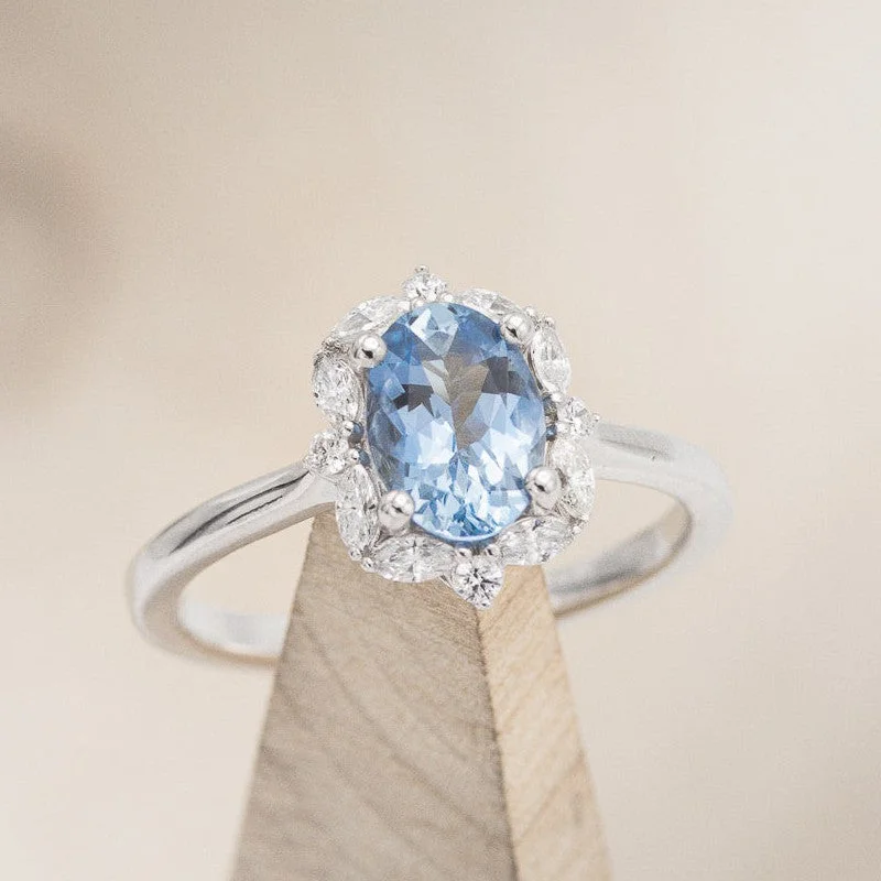 "ALICE" - OVAL AQUAMARINE ENGAGEMENT RING WITH DIAMOND HALO