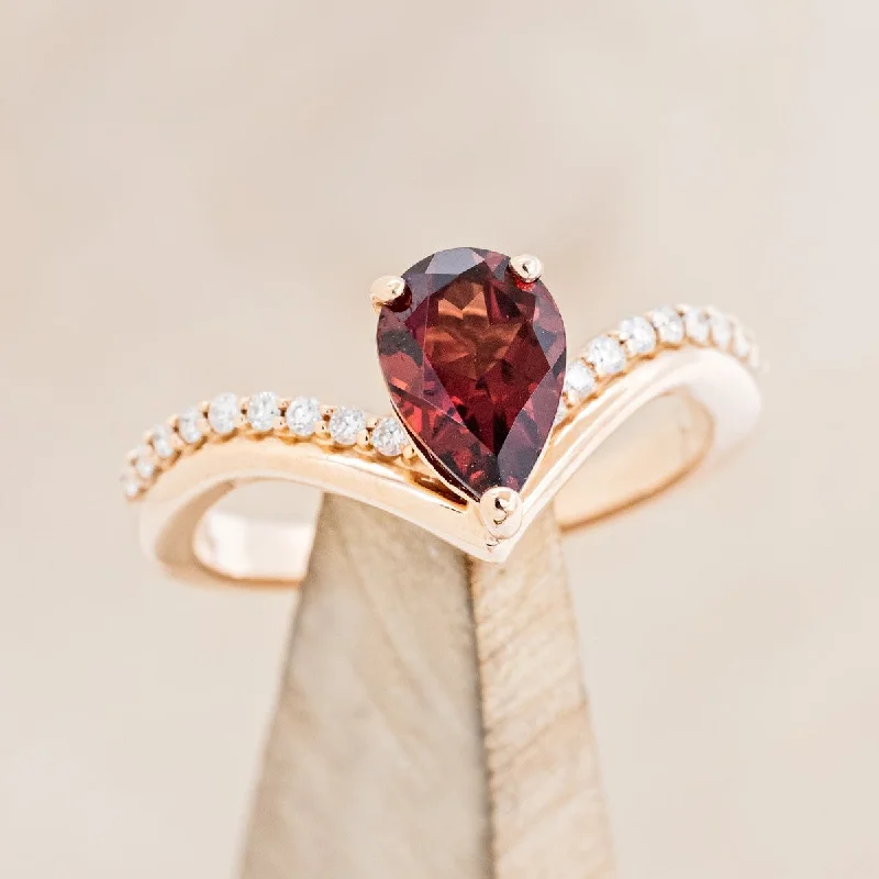 "IO" - PEAR CUT GARNET ENGAGEMENT RING WITH DIAMOND ACCENTS