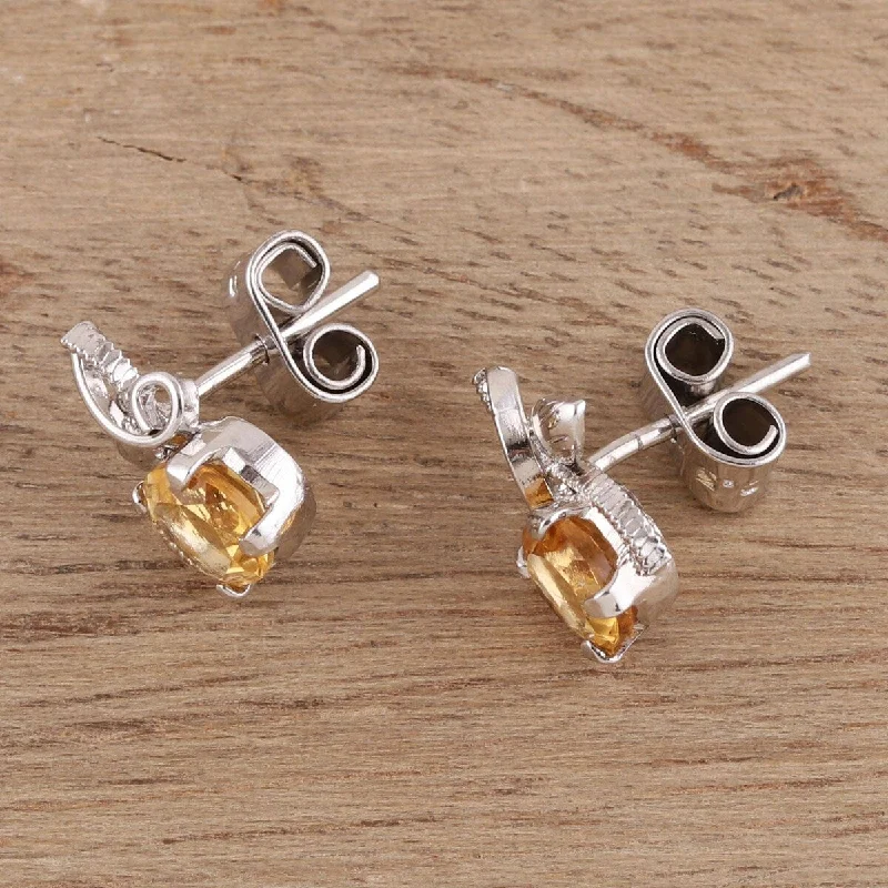 NOVICA Golden Bliss, Rhodium plated citrine stud earrings - 0.5*0.3