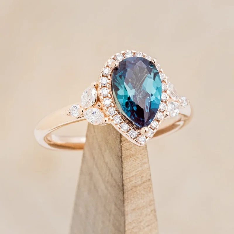 "DREAM" - PEAR CUT LAB-GROWN ALEXANDRITE ENGAGEMENT RING WITH DIAMOND HALO & ACCENTS