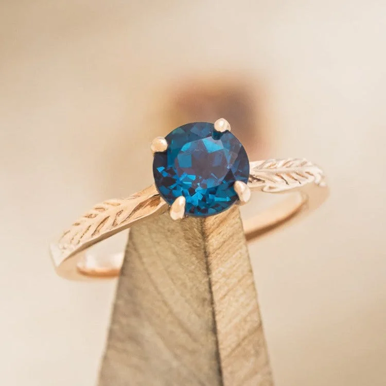 "HOPE" - ROUND CUT LAB-GROWN ALEXANDRITE SOLITAIRE ENGAGEMENT RING WITH FEATHER ACCENTS