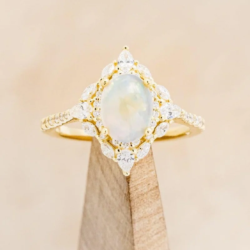 "NORTH STAR" - OVAL OPAL CABOCHON ENGAGEMENT RING WITH DIAMOND HALO