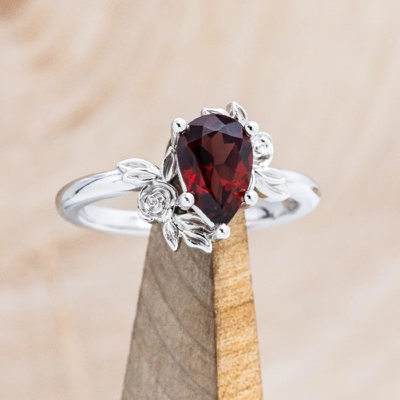 "ROSA" - PEAR CUT MOZAMBIQUE GARNET ENGAGEMENT RING WITH FLOWER ACCENTS