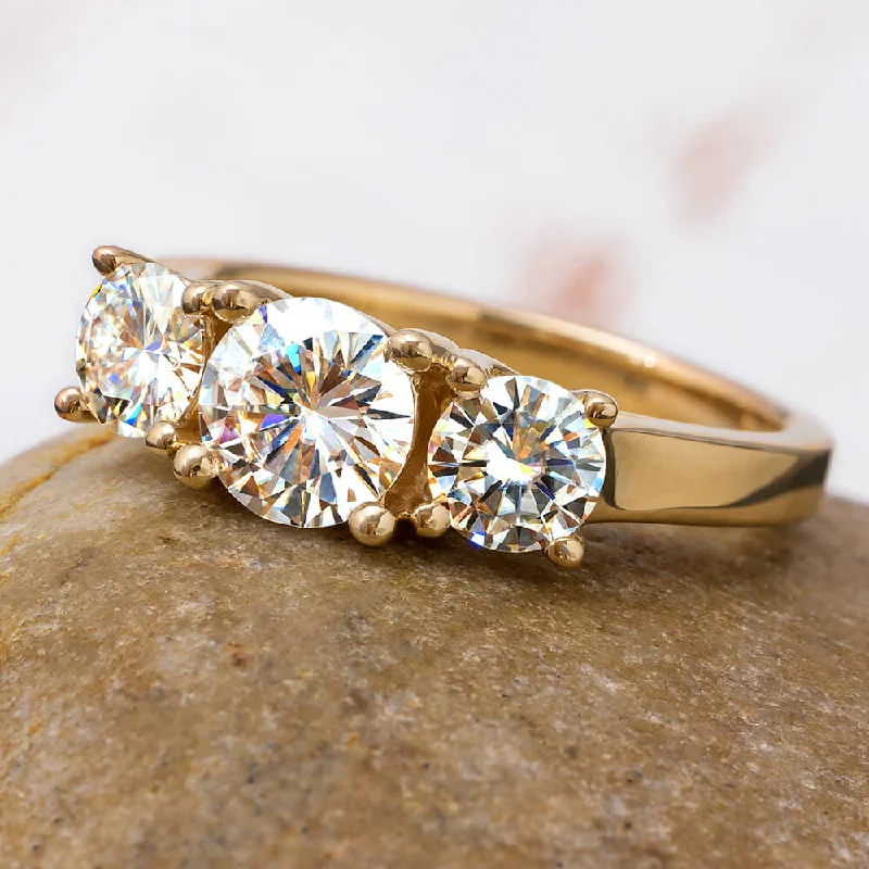 2 Carat TW Charles & Colvard Moissanite Three Stone Ring in Yellow Gold